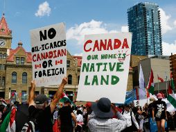 Manifestantes exigen a los líderes del G7 actuar con firmeza ante las guerras y las crisis migratorias que afectan a millones de personas. AFP