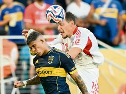 Tanto el club argentino como el portugués brindaron un encuentro ríspido que les dio un punto a ambos. AFP/P. De Melo