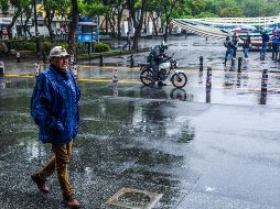 En la ajetreada, caótica e inundada metrópoli de Guadalajara, Meteored pronostica que los chubascos tormentosos.  EL INFORMADOR / A. Navarro