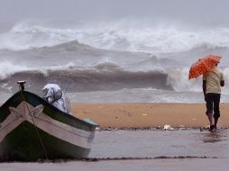 El Servicio Meteorológico Nacional (SMN), advirtió que la tormenta tropical “Flossie” ocasionará lluvias puntuales intensas —de 75 a 150 mm— en las áreas oeste y sur de Jalisco. EFE / ARCHIVO