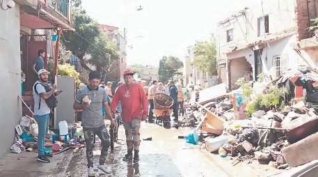En La Martinica, el Ayuntamiento notificó sobre el riesgo de vivir en zona prohibida y cerca del Arroyo Hondo, pero no hicieron caso. Perdieron todo tras una fuerte tormenta. Así viven ocho mil familias en la metrópoli, asentadas en sitios peligrosos durante el temporal. CORTESÍA/ Gobierno de Zapopan