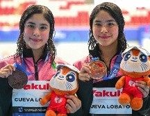 Con esta actuación, Mía y Lía Cueva aportaron la quinta medalla para México en el actual certamen internacional. AFP / F.X. Marit