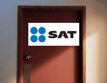 En una visita domiciliaria por el SAT, sus funcionarios tienen la autoridad para revisar documentos fiscales del contribuyente. UNSPLASH/ F. Feng