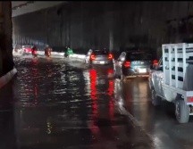 En Guadalajara se reportaron 8 vehículos varados por las inundaciones, al igual que 12 árboles caídos. ESPECIAL / POLICÍA VIAL