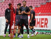Este viernes, los rojinegros del Atlas entrenaron en la cancha del Estadio Jalisco, escenario donde este domingo recibirán al América. ESPECIAL / Atlas FC