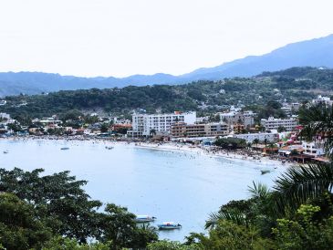 Este destino de playa se localiza en el municipio de Compostela, en el vecino estado de Nayarit, y es reconocido por sus aguas tranquilas. ESPECIAL / CANVA