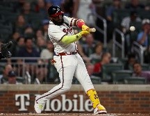 Marcell Ozuna batea un sencillo productor de una carrera en la tercera entrada. AP/C. Hubbard