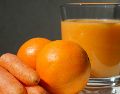 Descubre los beneficios del jugo de naranja con zanahoria. UNSPLASH / V. FILIPOVIC