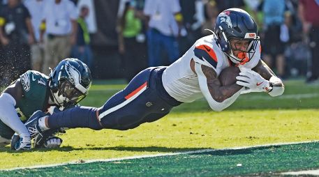 Evan Engram tuvo una recepción para anotación que cambió el rumbo del juego a favor de los Broncos. AP