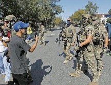 El DHS ha mencionado que grupos de izquierda y pandillas hispanas espían a los agentes en Portland y en Chicago. AFP/O. Jones