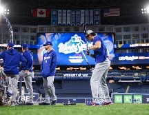 La Serie Mundial 2025 enfrenta a Los Angeles Dodgers y Toronto Blue Jays en una final inesperada por los fanáticos del beisbol de las Grandes Ligas. AFP / C. Burston
