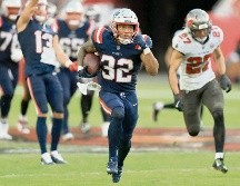 Treveyon Henderson tuvo dos escapadas de más de 50 yardas para anotación. AFP