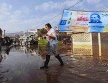 Para recibir el pago se les enviará un mensaje de texto (SMS) a los beneficiarios al número telefónico que registraron como medio de contacto para informarles el día, hora y módulo donde les corresponde recibir su apoyo. SUN / ARCHIVO