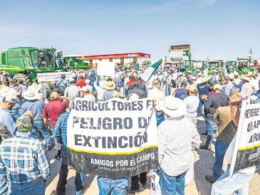 Mientras Tlajomulco y el Gobierno de Jalisco aumentan apoyos a los maiceros, éstos amenazan con repetir bloqueos a nivel nacional el próximo 24 de noviembre, por diferencias con el Gobierno federal. EL INFORMADOR/ A. Navarro