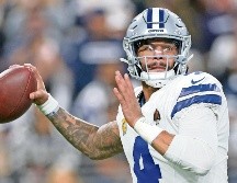 Dak Prescott hizo cuatro pases de anotación y sumó 246 yardas. AFP/C. Petersen