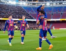 Con este resultado, coronado con un espectáculo de música y fuegos artificiales tras el pitido final, el Barça sumó tres puntos que le sitúan líder del campeonato  español. EFE / S. Wu