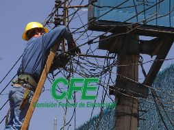 Estas personas se hacen pasar por trabajadores de la CFE y engañan a los usuarios mediante falsas notificaciones de multa y corte del servicio. EL INFORMADOR / ARCHIVO