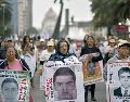 En el documento, la CNDH reconoce solamente a 40 estudiantes desaparecidos de los 43; los otros tres fueron "víctimas de ejecución extrajudicial". AFP/ARCHIVO