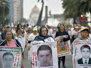 En el documento, la CNDH reconoce solamente a 40 estudiantes desaparecidos de los 43; los otros tres fueron "víctimas de ejecución extrajudicial". AFP/ARCHIVO