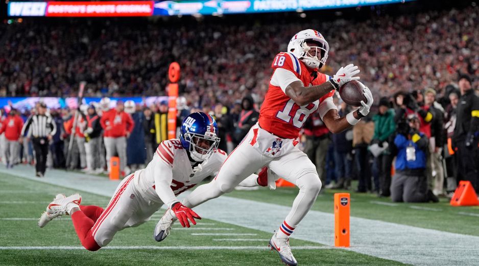 Los Patriots alcanzan una marca de 11-2, dejando a los Giants hundidos en un 2-11. AP/ C. Krupa.