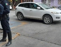 Cuatro personas llegaron en una camioneta blanca Mazda; uno de ellos bajó y disparó tres veces contra la motociclista. EL INFORMADOR / RUBÍ BOBADILLA 