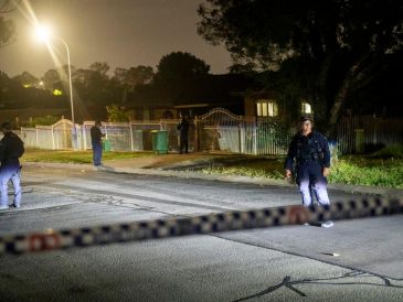 Se establece una escena del crimen en la vivienda de un sospechoso en el suburbio de Bonnyrigg, tras el tiroteo ocurrido en Bondi Beach, Sídney. EFE/EPA/J. Piper