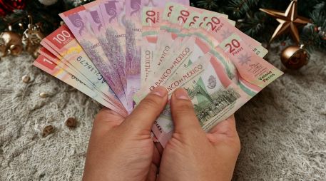 Navidad es día libre para las y los trabajadores en México. Esto significa que quienes laboren con normalidad deben percibir el pago de su día más el doble de su salario. ESPECIAL / CANVA