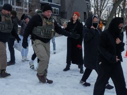 Manifestantes reclamaron justicia y cambios en la política migratoria tras la muerte de una mujer estadounidense. EFE/O. Fedorova