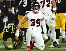 Henry To'oto'o, linebacker de los Texans de Houston, reacciona tras detener al corredor de los Steelers de Pittsburgh Kenneth Gainwell. AP/J. Berl