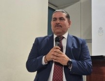 El vicefiscal Alfonso Gutiérrez informó que peritos analizan autos con placas de Michoacán usados en el homicidio de Alberto Prieto ocurrido en Zapopan. EL INFORMADOR/R. Bobadilla