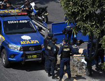 Los asesinatos se produjeron un día después de que grupos de pandilleros tomaran como rehenes a 46 personas, en su mayoría custodios, en tres cárceles del país. AFP / J. ORDONEZ
