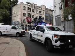 Un amplio convoy de la Guardia Nacional acompañó una ambulancia forense de la Fiscalía General de la República (FGR). SUN/ V. ROSAS.