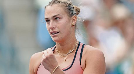 La bielorrusa celebró su partido número 100 como número uno del mundo. AFP/H. How