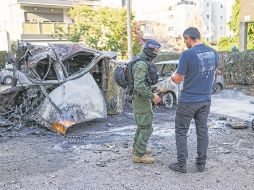 Secuelas de un ataque contra Tel Aviv. Irán lanzó misiles contra la capital israelí, donde las autoridades han recomendado el uso de búnkeres para los ciudadanos. AFP