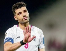 Mehdi Raremi. El delantero iraní y el resto de sus compañeros de Selección siguen en medio de una encrucijada de cara al Mundial. AFP