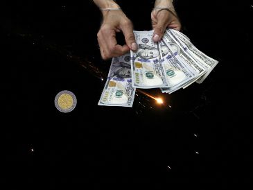 Esta es la cotización del tipo de cambio de dólar a pesos mexicanos para la mañana de este miércoles 25 de marzo. EFE / ALA BADARNEH