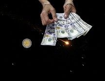 Esta es la cotización del tipo de cambio de dólar a pesos mexicanos para la mañana de este miércoles 25 de marzo. EFE / ALA BADARNEH