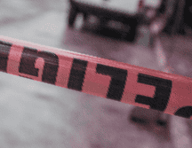 Frente al casino Real Americana, en Tlaquepaque, localizaron a tres jóvenes tirados en la vía pública, junto a una motocicleta. EL INFORMADOR/ARCHIVO