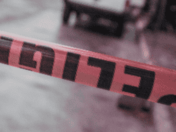 Frente al casino Real Americana, en Tlaquepaque, localizaron a tres jóvenes tirados en la vía pública, junto a una motocicleta. EL INFORMADOR/ARCHIVO