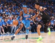 Ambas quintetas se volverán a enfrentar el miércoles en el segundo duelo de la serie. AFP/ Z. BEEKER.