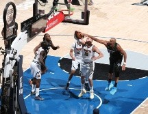 Rudy Gobert demostró por qué ha sido cuatro veces Jugador Defensivo del Año, registrando tres tapones e incomodando a Nikola Jokic durante todo el juego. AFP/ D. SHERMAN.