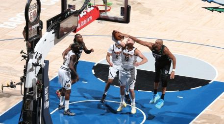 Rudy Gobert demostró por qué ha sido cuatro veces Jugador Defensivo del Año, registrando tres tapones e incomodando a Nikola Jokic durante todo el juego. AFP/ D. SHERMAN.