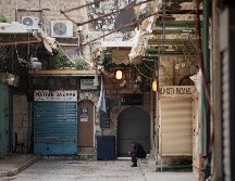 Puerta de la iglesia del Santo Sepulcro en el casco viejo de Jerusalén, zona que alberga lugares sagrados para el cristianismo, el judaísmo y el islam y que ha sido escenario de ataques de odio. AP/M. Illean)