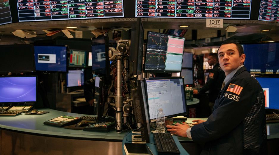 Las ganancias en las tecnológicas y en las compañías de microprocesadores impulsaron a dos de los tres indicadores de Wall Street. AFP/ARCHIVO