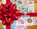 El aguinaldo se entrega de cara a las celebraciones de Navidad a finales de cada año. ESPECIAL / CANVA