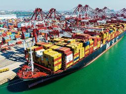 El comercio de exportación entre México y Estados Unidos mantiene actividad constante mientras avanzan las negociaciones para la revisión del T-MEC. AFP