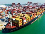 El comercio de exportación entre México y Estados Unidos mantiene actividad constante mientras avanzan las negociaciones para la revisión del T-MEC. AFP