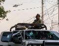 Las autoridades continúan con las investigaciones en torno al inmueble cateado, mientras la zona permanece bajo vigilancia federal. EL INFORMADOR/ARCHIVO