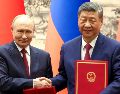 Vladimir Putin y Xi Jinping aprobaron una segunda declaración sobre el establecimiento de un mundo multipolar y unas relaciones de nuevo tipo. EFE/A. Kazakov