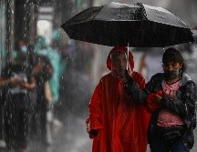 La SGIRPC recomendó a la población transitar con cuidado debido a los encharcamientos. SUN/ARCHIVO